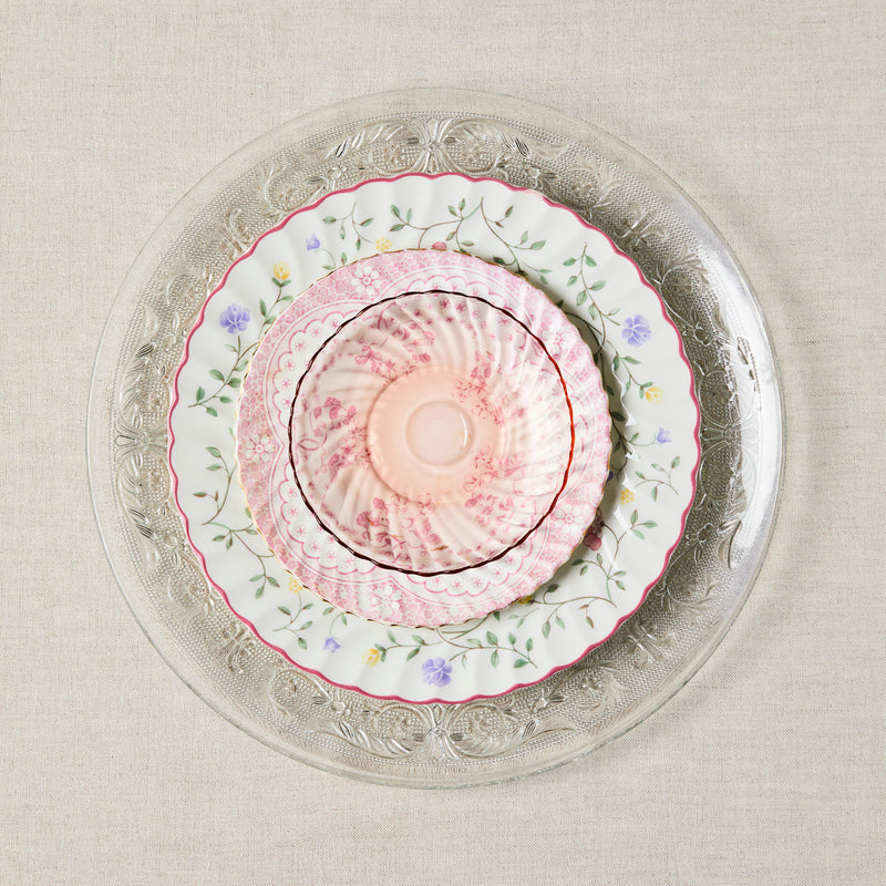 Clear embossed and pink floral vintage mixed plates.