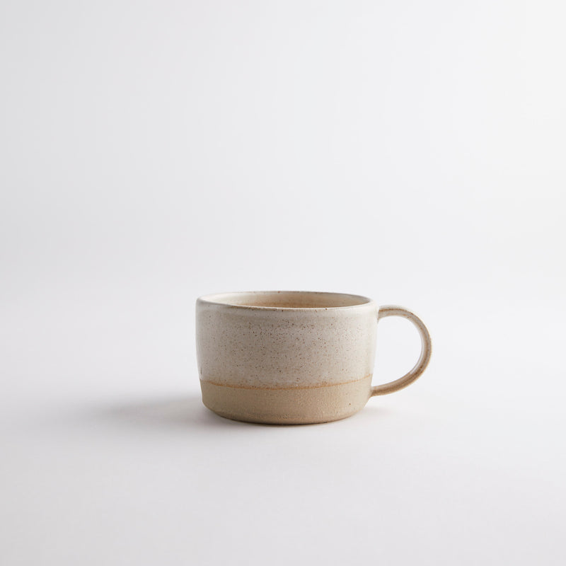 Beige stone with light brown base coffee cup.