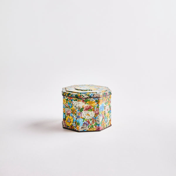 Multicolour rustic floral tin.