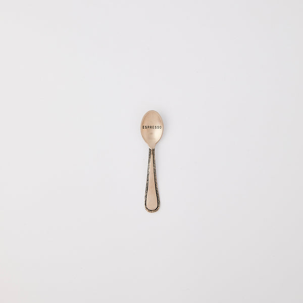 Silver with espresso text spoon. 