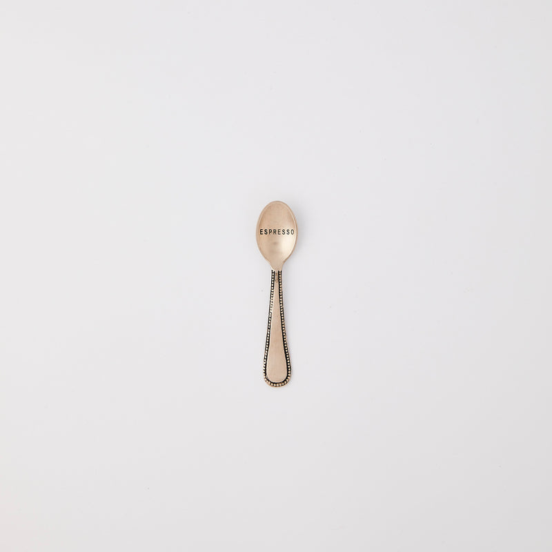 Silver with espresso text spoon. 