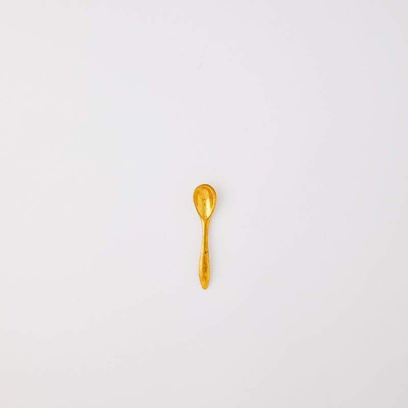 Gold spoon. 