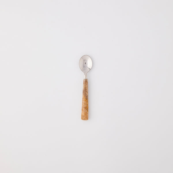 Silver spoon with wooden handle.