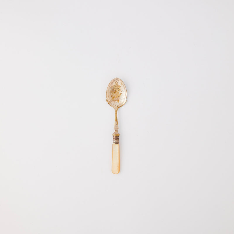 Silver antique spoon with pearl handle. 