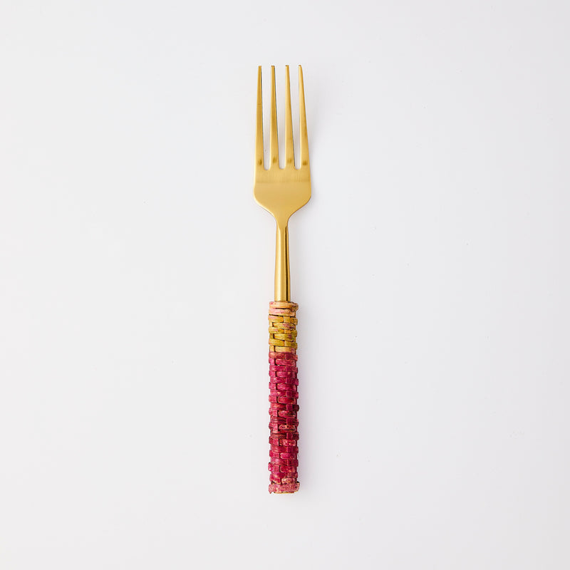 Gold with pink handle fork.