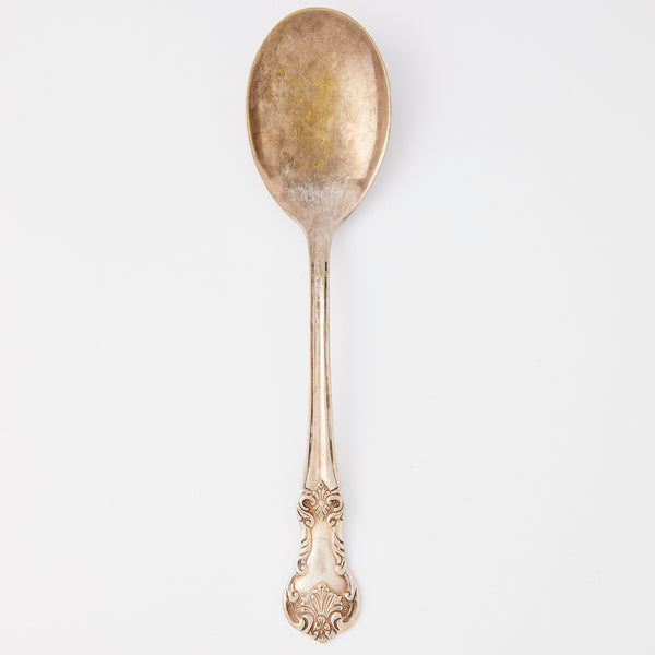 Bronze silver spoon.