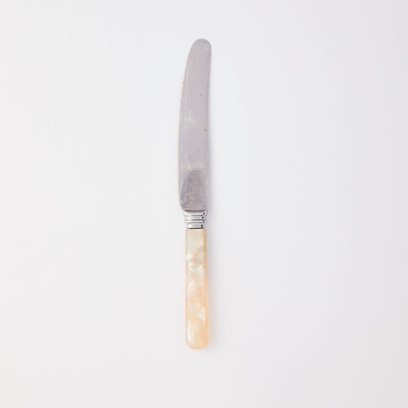 Silver with pearl handle knife.