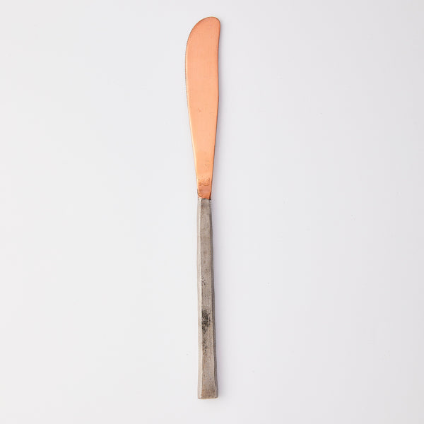 Bronze with silver handle knife. 