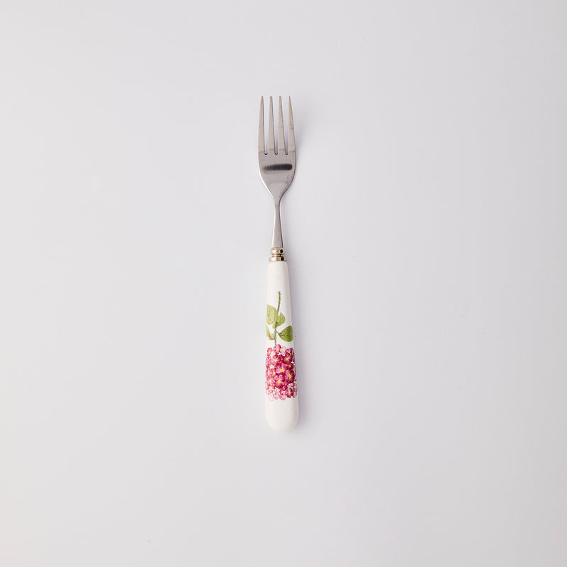 Silver fork with white and pink flower handle. 