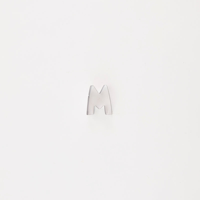 Letter "M" cutter.