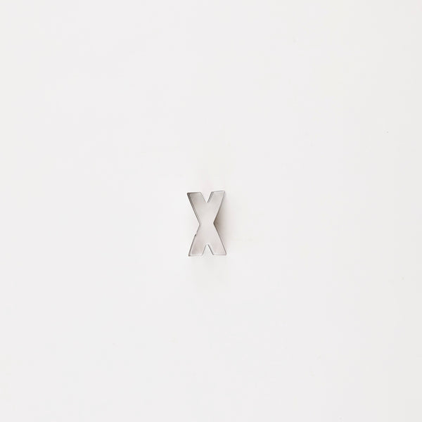 Letter "X" cutter.