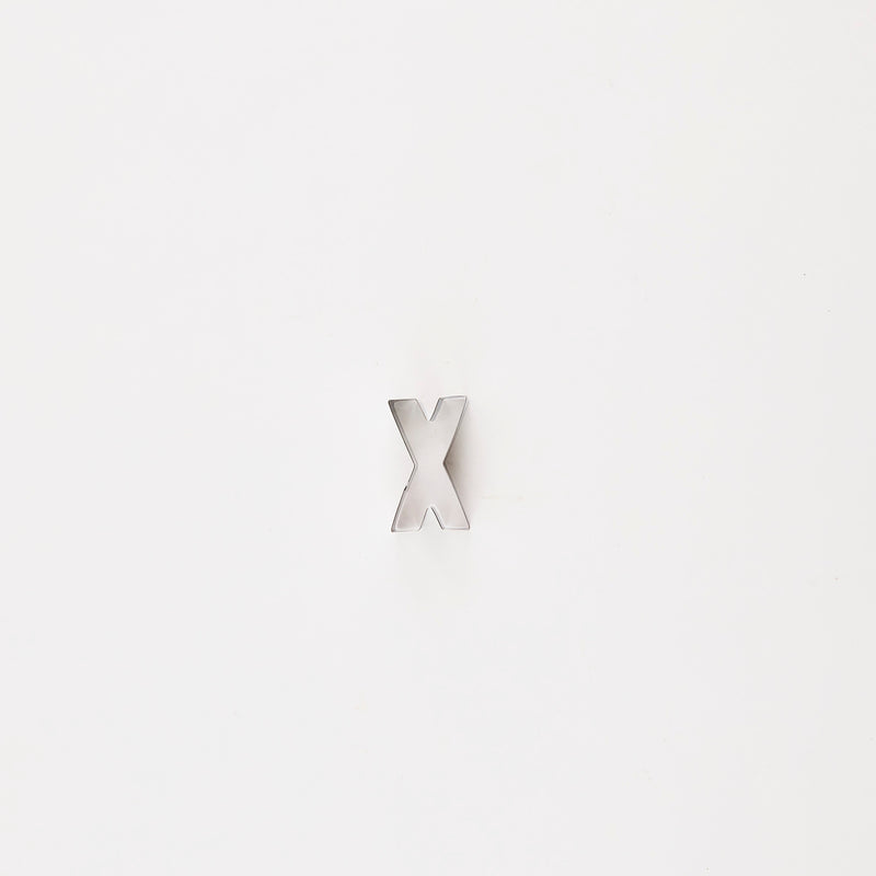 Letter "X" cutter.