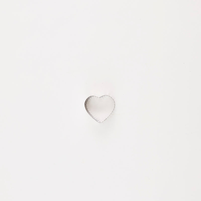 Silver heart shaped cutter.