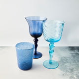 Mixed blue glass set. 