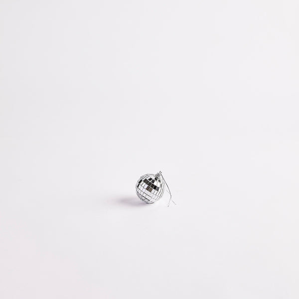 Small silver disco ball.