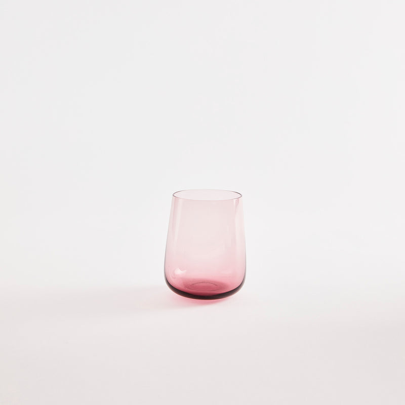 Pink glass tumbler.