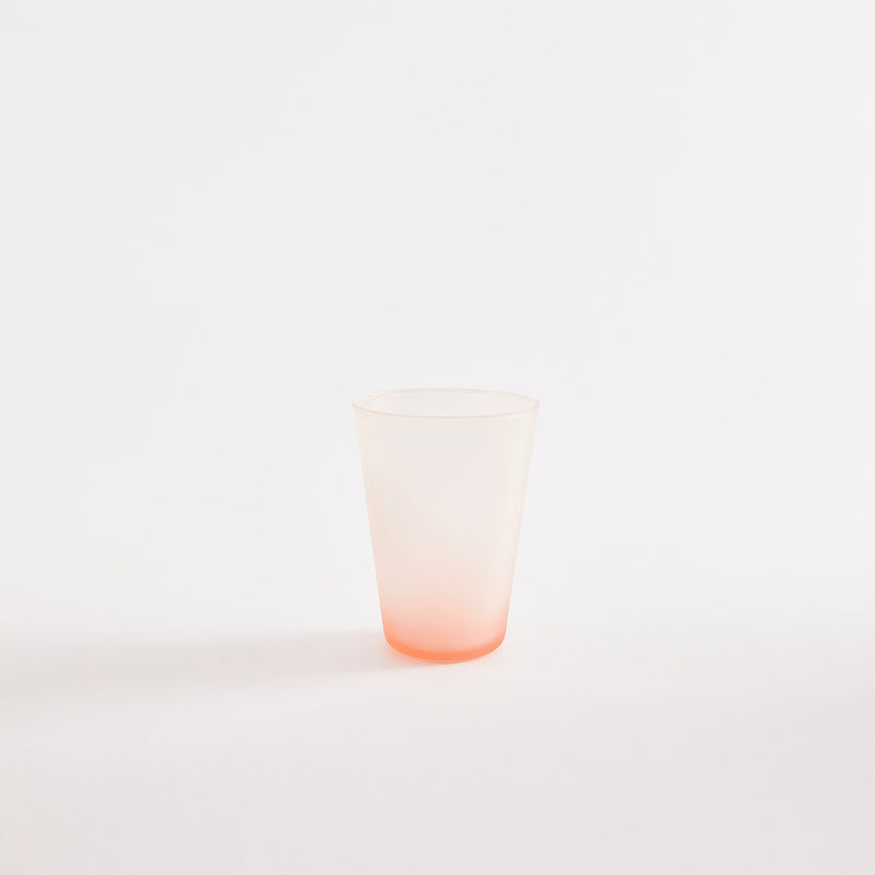 Pink ombre glass tumbler.