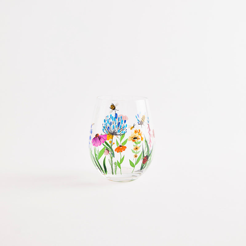 Multicoloured floral design glass tumbler.