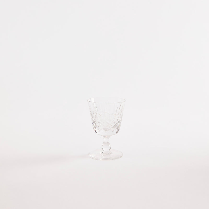 Clear glass goblet with etched design.