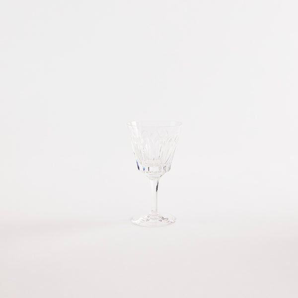 Clear glass goblet with etched design.