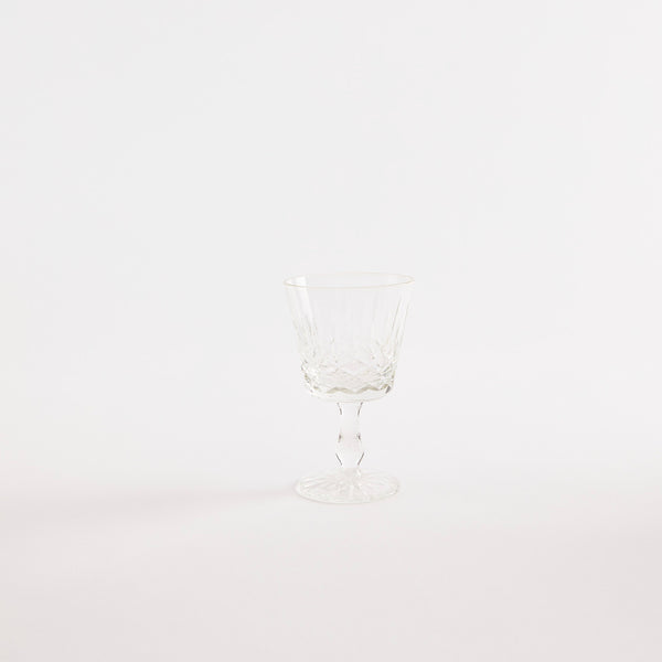 Clear glass goblet with etched design.