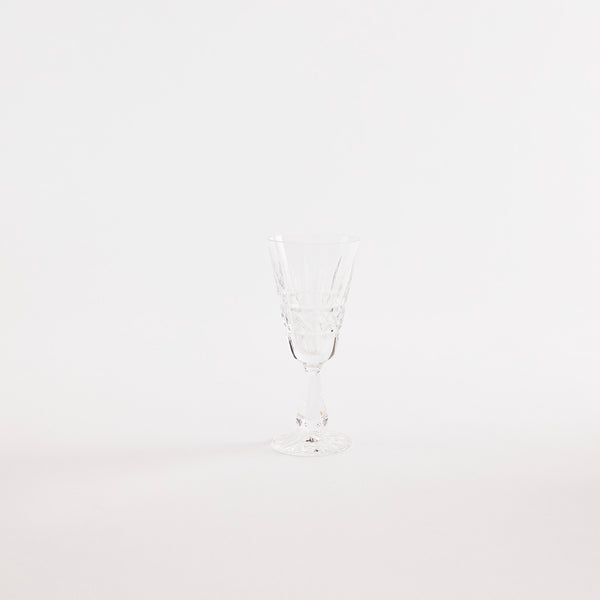 Clear glass goblet with etched design.