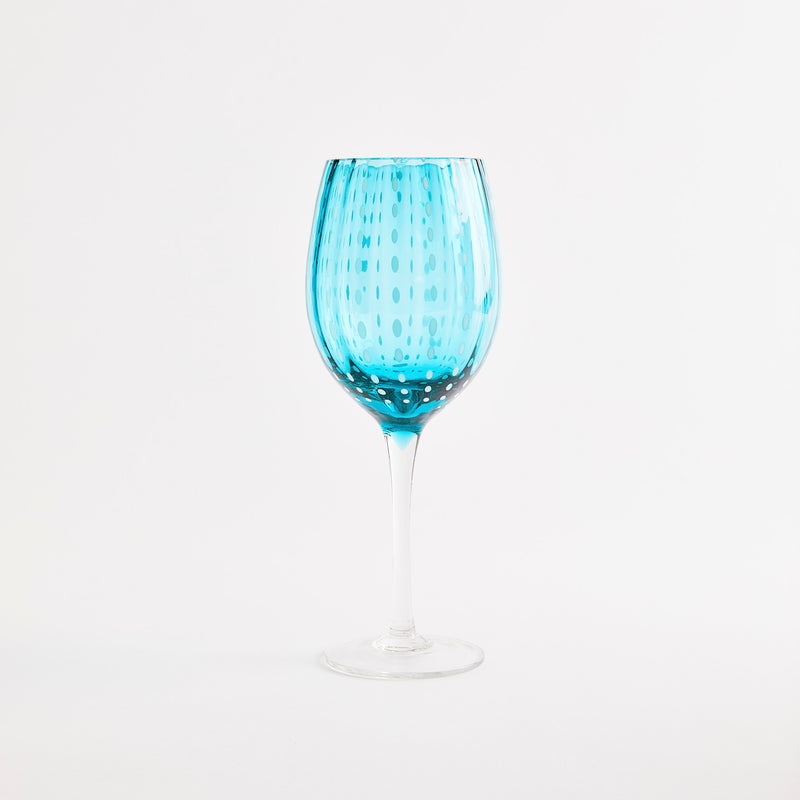 Turquoise with white dotted design wine glass.