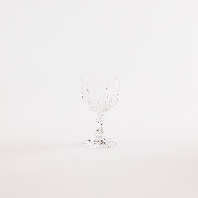 Clear glass goblet with etched design.