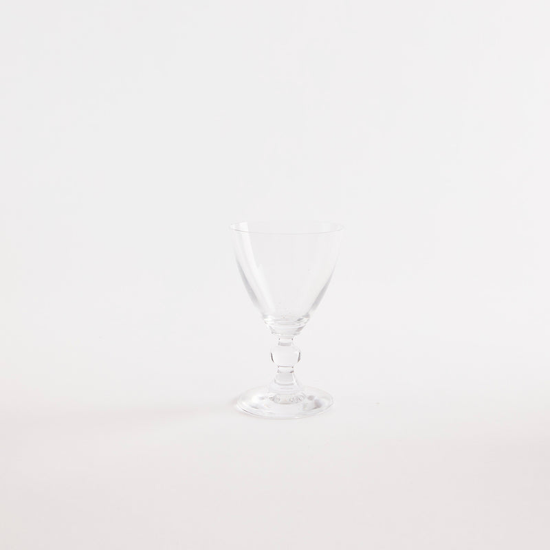 Clear glass goblet.