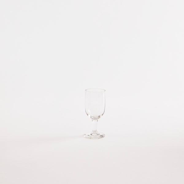 Clear glass goblet.