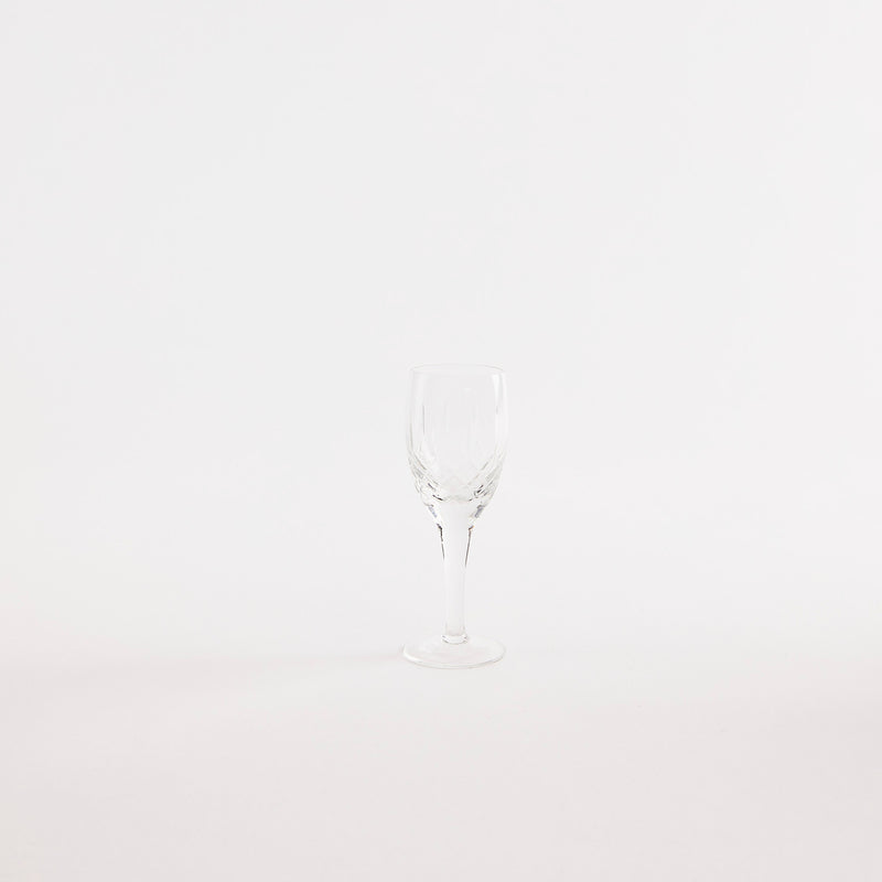 Clear glass goblet with etched design.