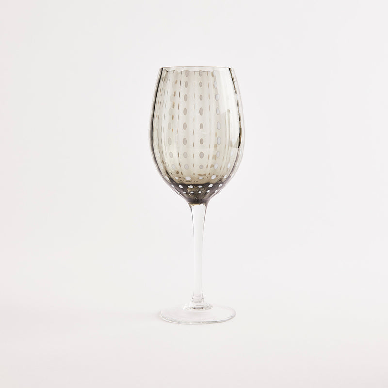 Grey with white dotted design wine glass.