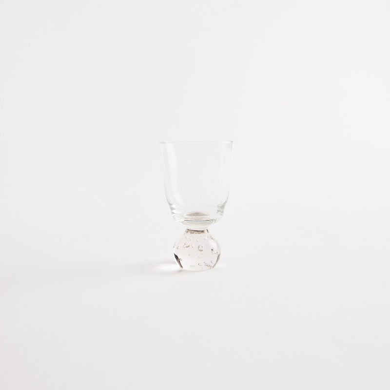 Clear glass with bubble base.