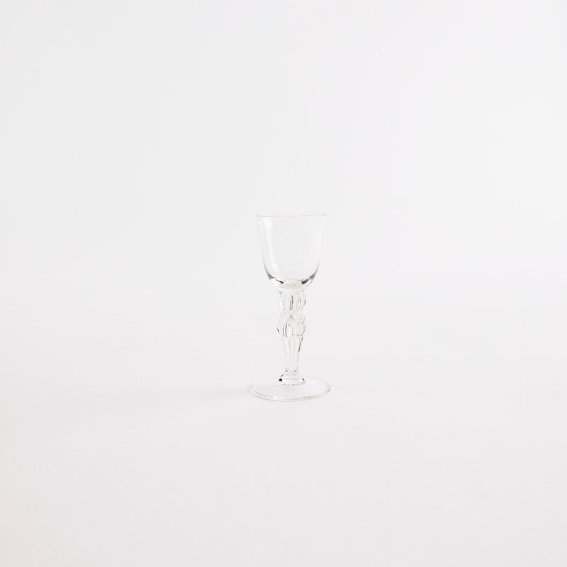 Clear glass with stem.