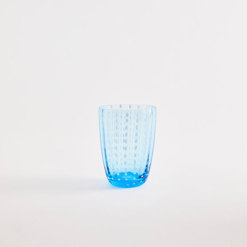 Blue with white dotted design glass tumbler.