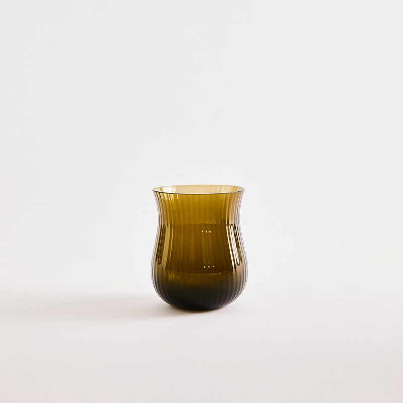 Olive glass tumbler.