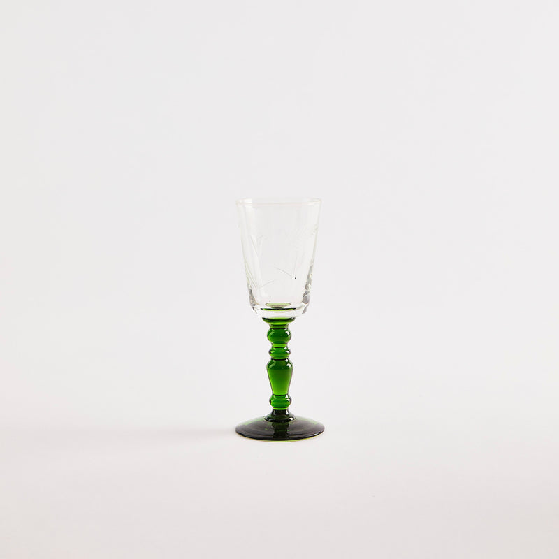 Clear fluted glass with green base.