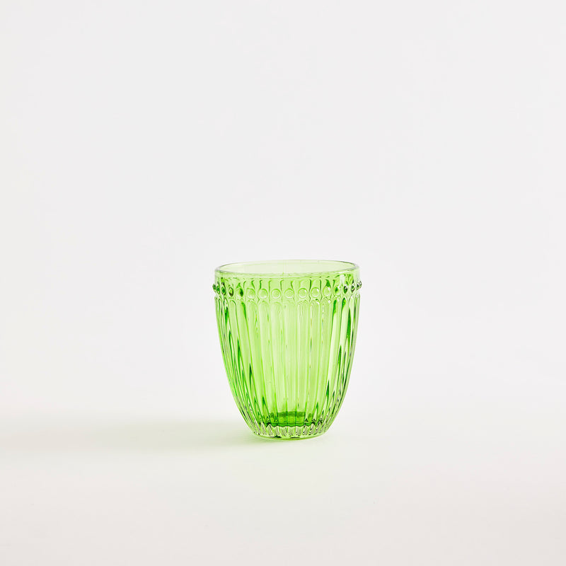 Green glass tumbler with embossed design.