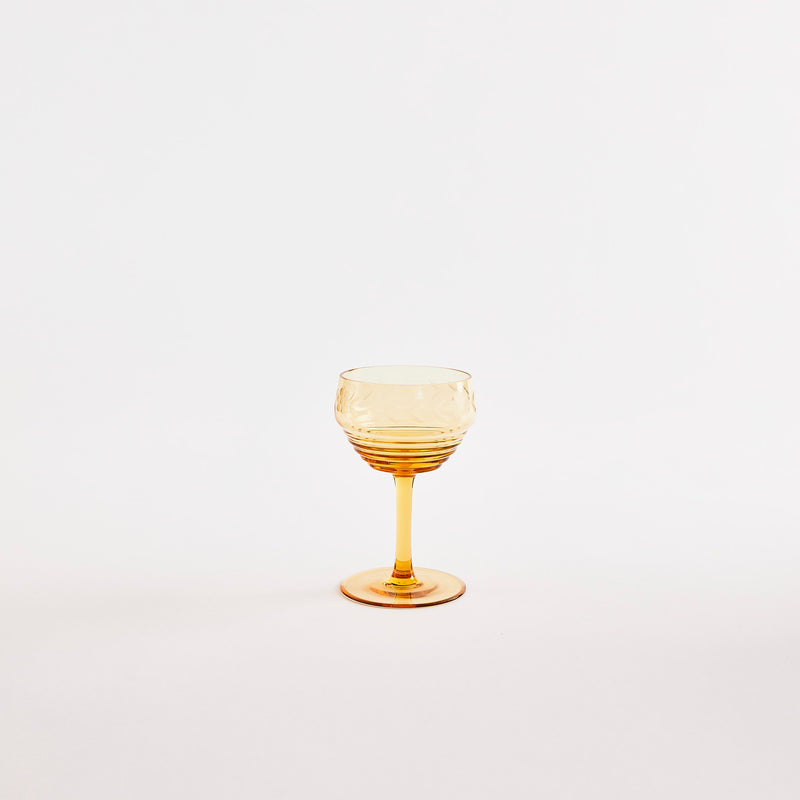 Yellow wine glass.