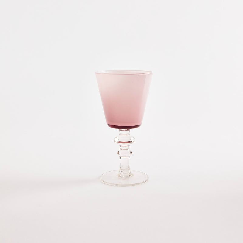 Pink glass goblet with clear base.