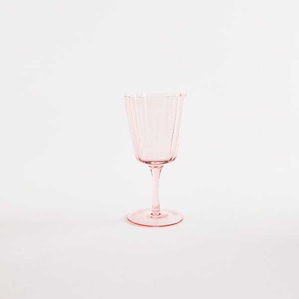 Pink glass with stem.