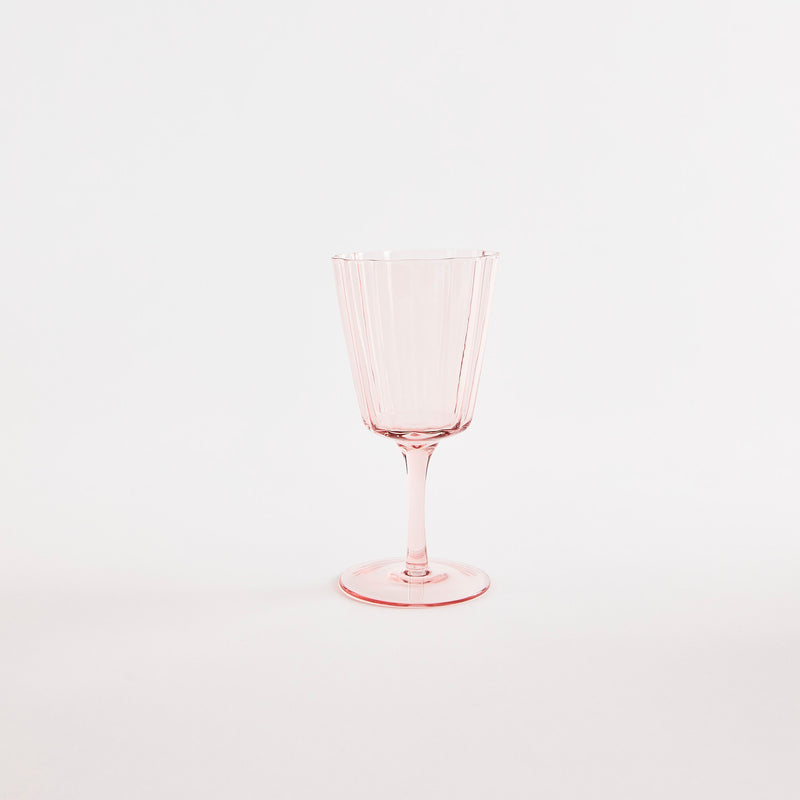 Pink glass with stem.