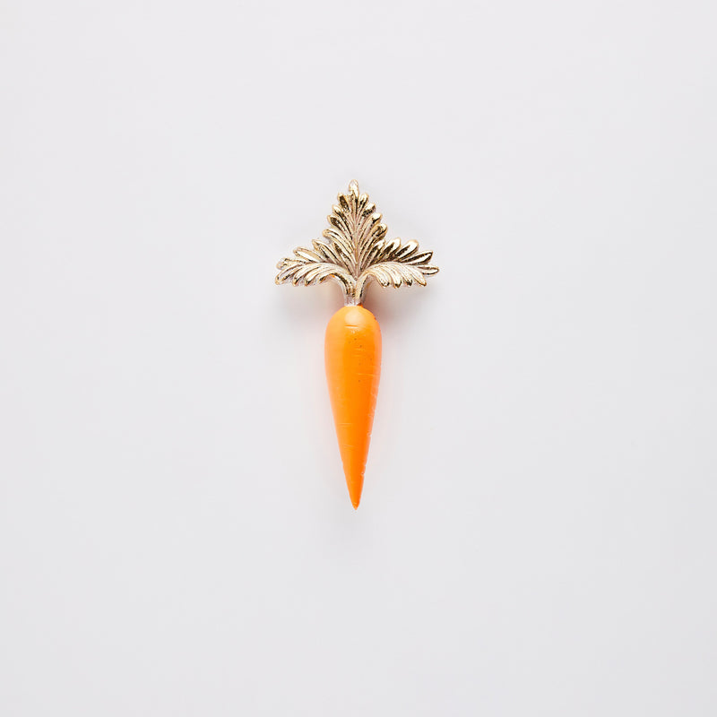 Carrot with gold top decoration.