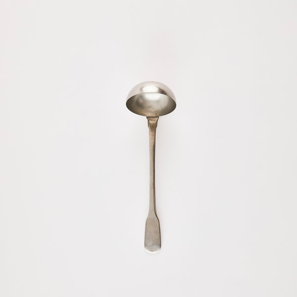 Silver ladle.