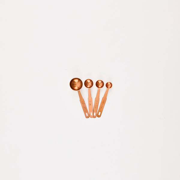 Copper measuring spoons.