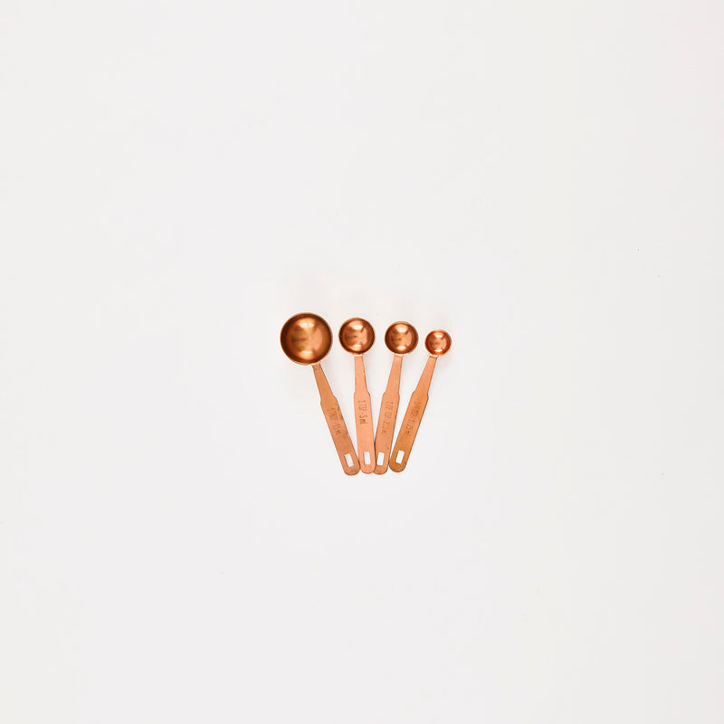 Copper measuring spoons.