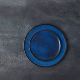 Top view of blue plates on Moonlight Background. 