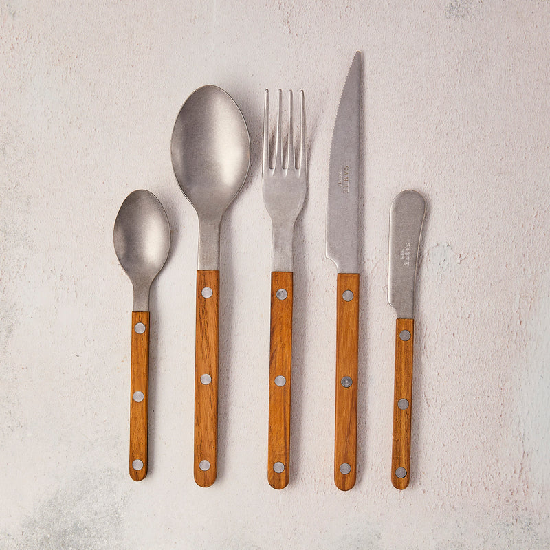 Silver with wooden handle cutlery.