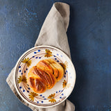 Top view of pastry on plate on Navy Blue Background