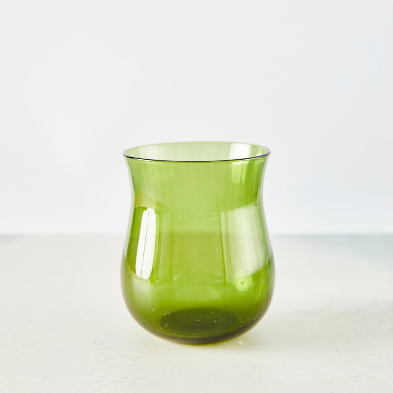 Olive green glass tumbler.